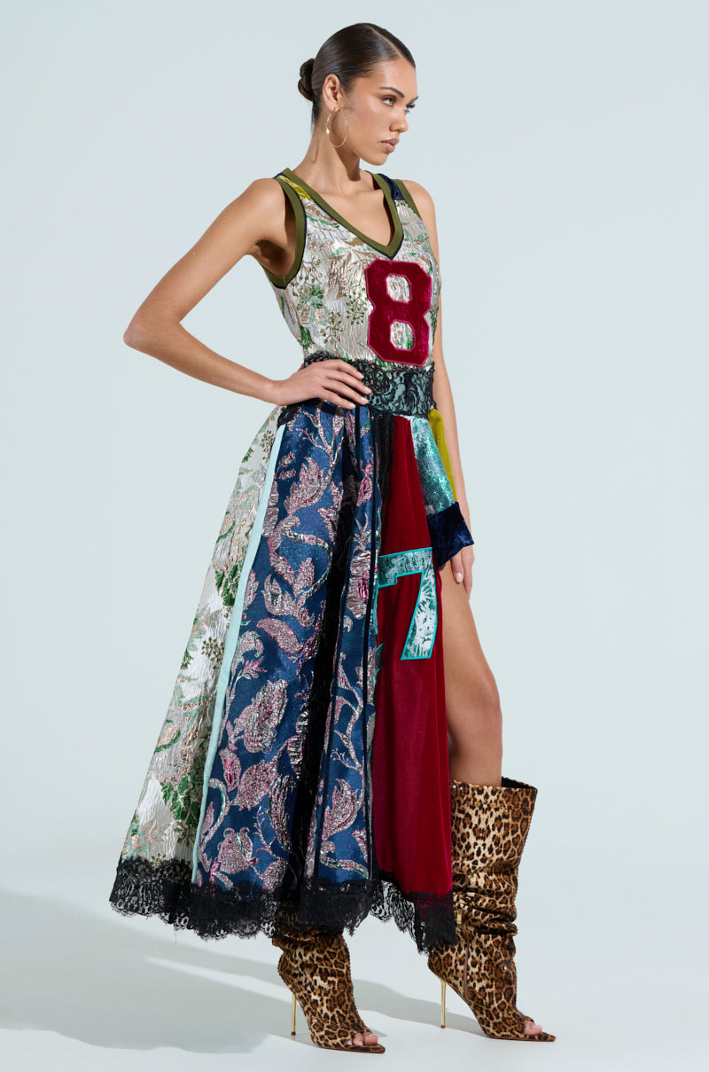 CLEAT CHASER LAYERED JERSEY HIGH LOW DRESS IN BROCADE